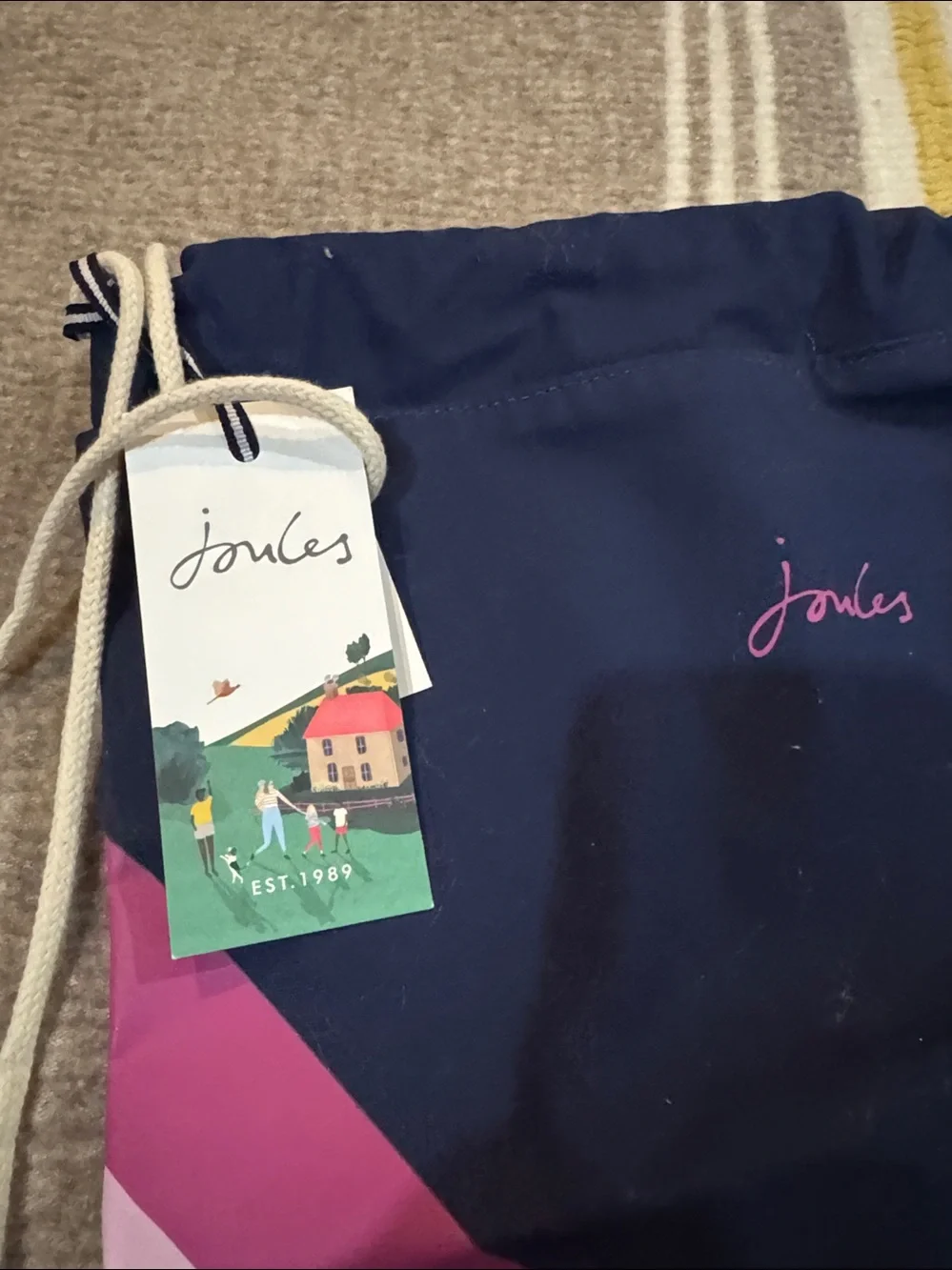 Joules Navy Drawstring Backpack with Rainbow Rays and Horse Motif